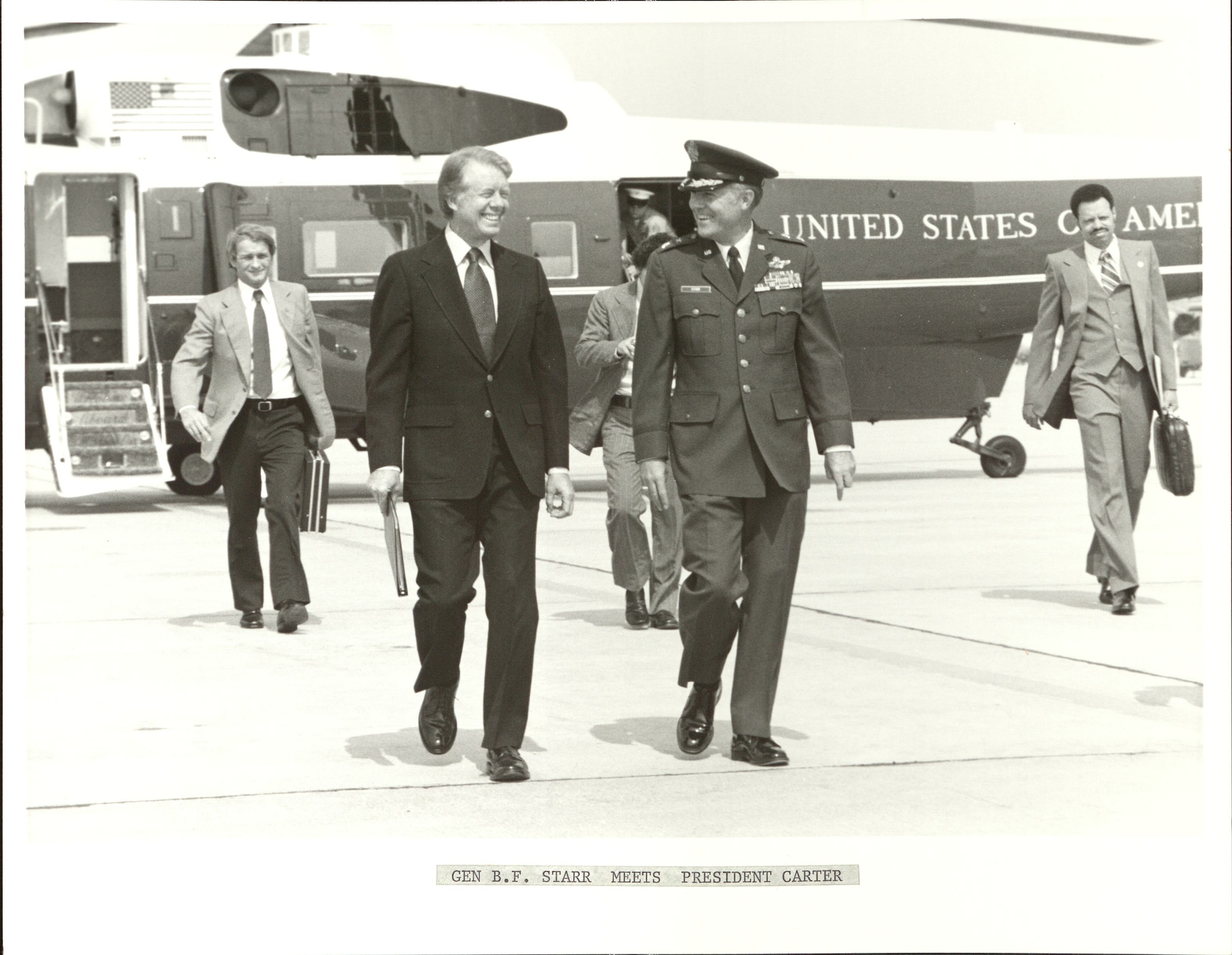 Brig. Gen. Benjamin F. Starr, 76th Military Airlift Wing commander, greets President Jimmy Carter as he arrives at Andrews Air Force Base, Maryland, in the late 1970s. Carter became the seventh president who used Joint Base Andrews – then Andrews Air Force Base – as a hub for presidential air travel. (U.S. Air Force photo from 316th Wing History Office)
