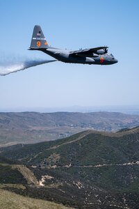 A C-130 (MAFFS 9) from Nevada Air National Guard's 152nd Airlift Wing performs a water drop May 8, 2024,