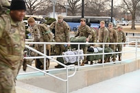 Members of the Maryland National Guard and Pennsylvania National Guard arrive to the D.C. Armory to prepare for the joint reception station onward integration (JRSOI) in preparation for the electoral certification mission, Jan. 5, 2024. The Counting and Certification of Electoral Votes was designated a National Special Security Event (NSSE).