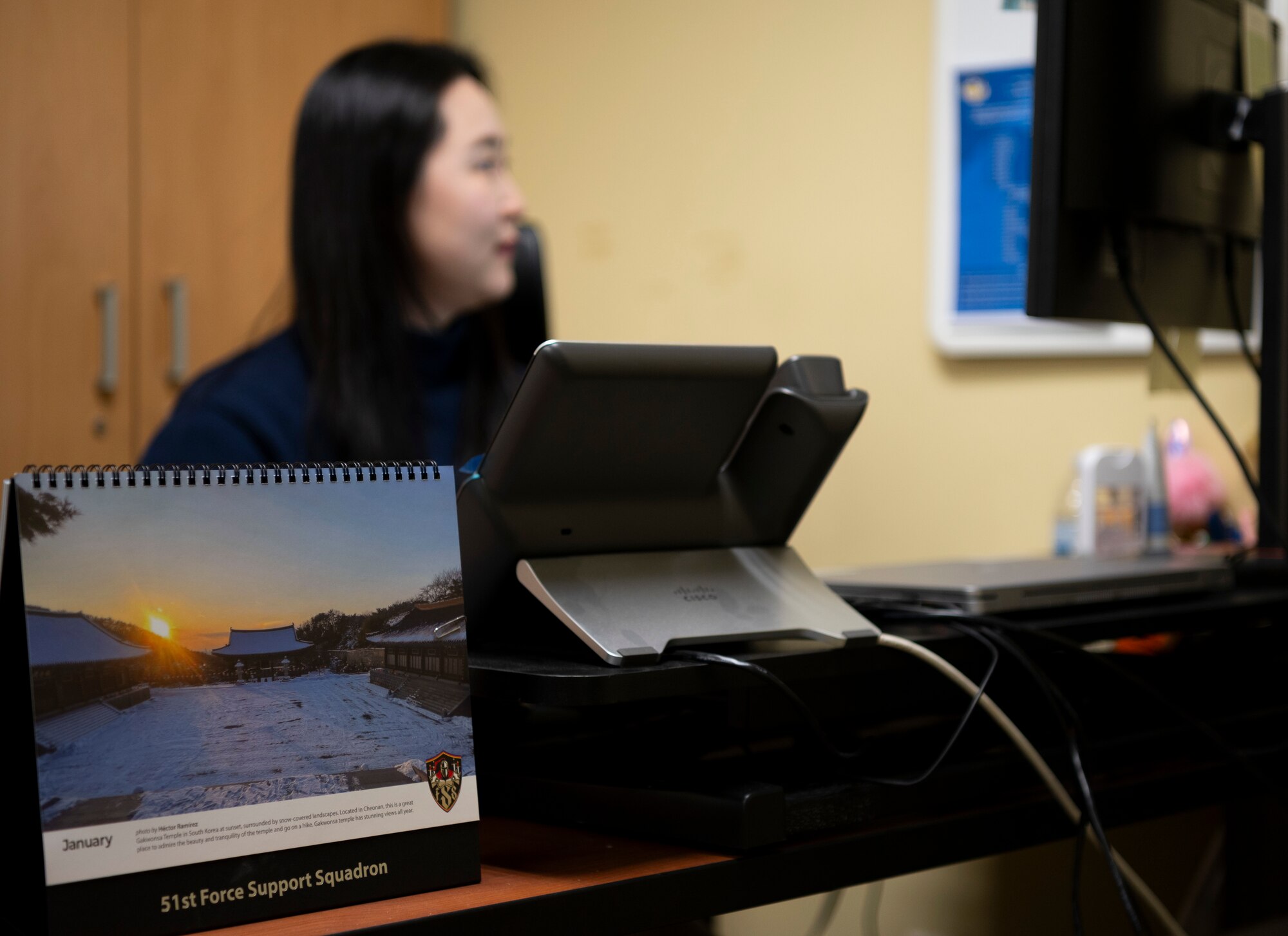 Ms. Chong, Chu Hyon, 51st Force Support Squadron administrative assistant, checks her email at Osan Air Base, Republic of Korea, Jan. 8, 2024. Chong was named the 51st Fighter Wing Mustang of the Week for her hard work and dedication to her unit and Team Osan. With the high turnover rate at Osan, civilian employees like Ms. Chong are vital in helping things run smoothly when military members transition in and out. (U.S. Air Force photo by Staff Sgt. Ashley N. Mikaio)