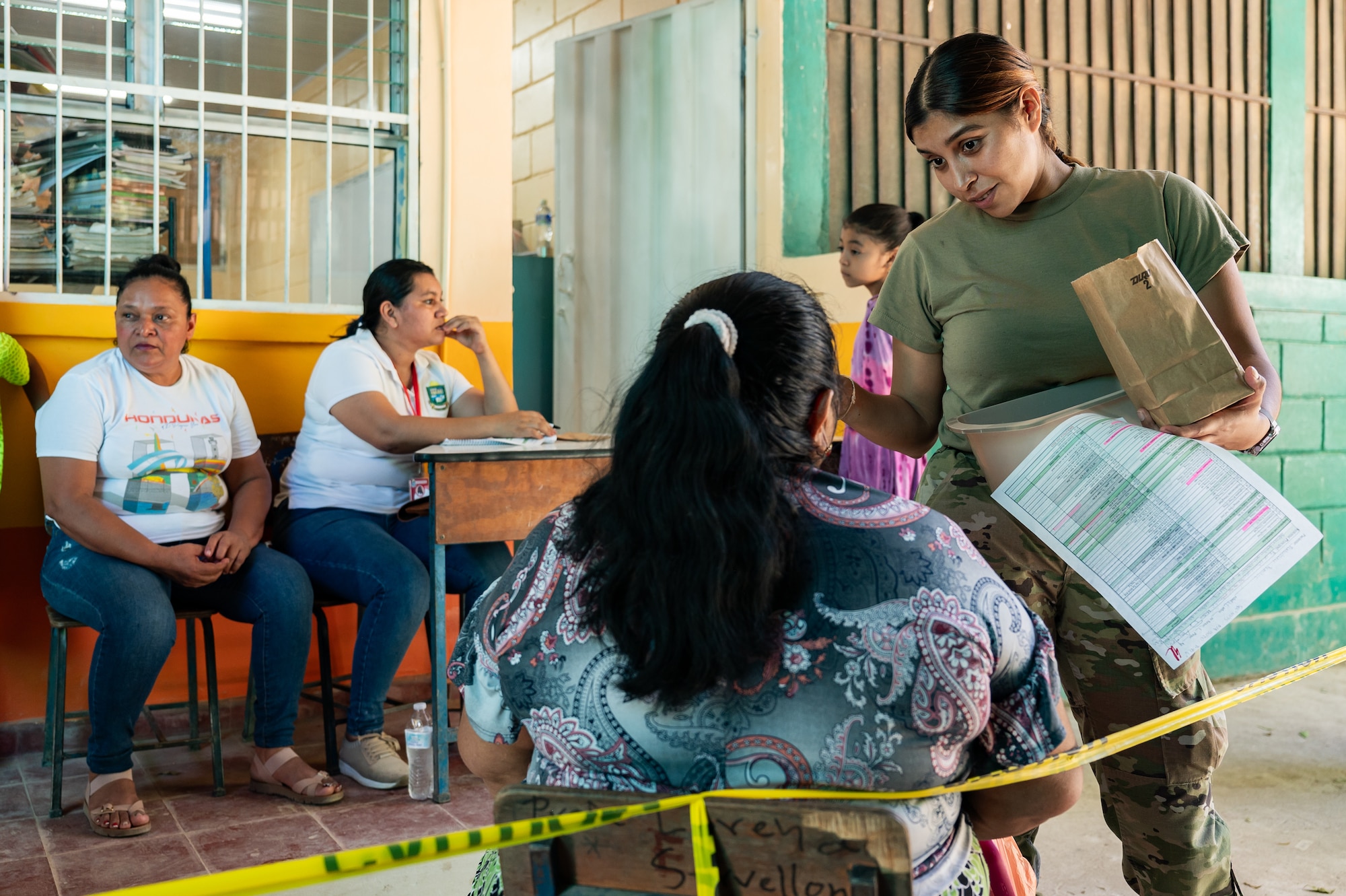 U.S. Army Sgt. Giselle Aguilar, Joint Task Force-Bravo 349th Medical Detachment medic, gives prescription medication to a patient during a Medical Readiness Training Exercise in Choluteca, Honduras, January 8, 2025.