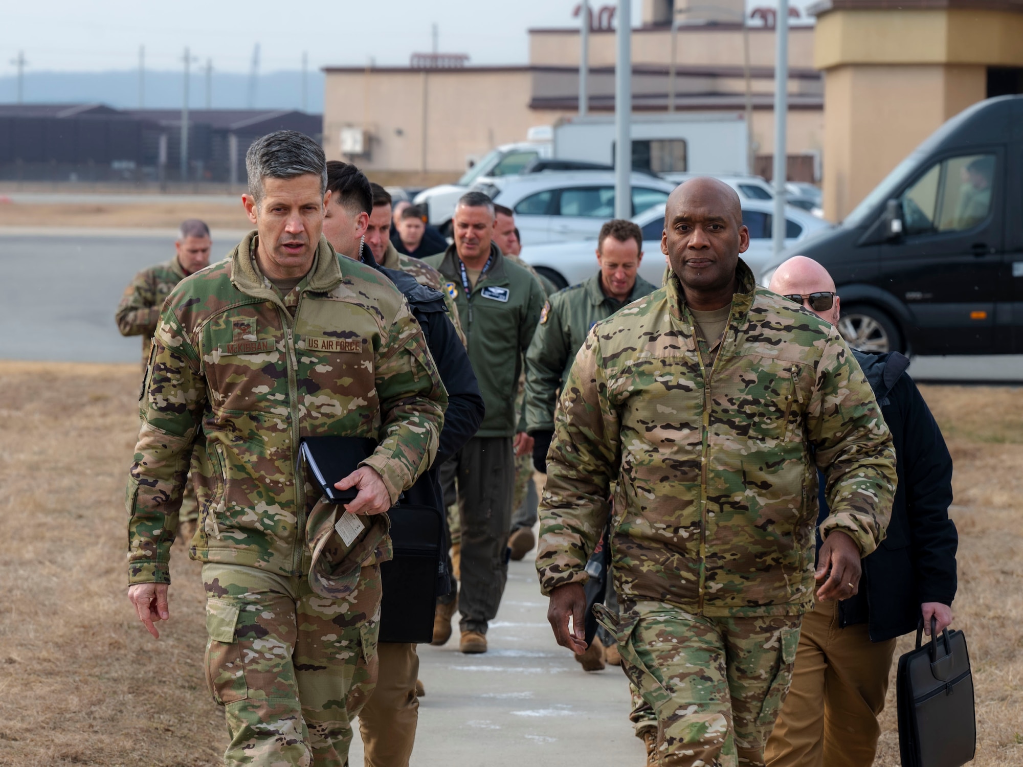 U.S. Air Force Col. William McKibban, 51st Fighter Wing commander, left, walks with U.S. Army Gen. Xavier T. Brunson, United Nations Command, Combined Forces Command and United States Forces Korea commander, during a visit at Osan Air Base, Republic of Korea, Jan. 8, 2025. The visit provided the USFK commander an opportunity to better understand the 51st FW and CACC’s mission. (U.S. Air Force photo by Senior Airman Sabrina Fuller-Judd)