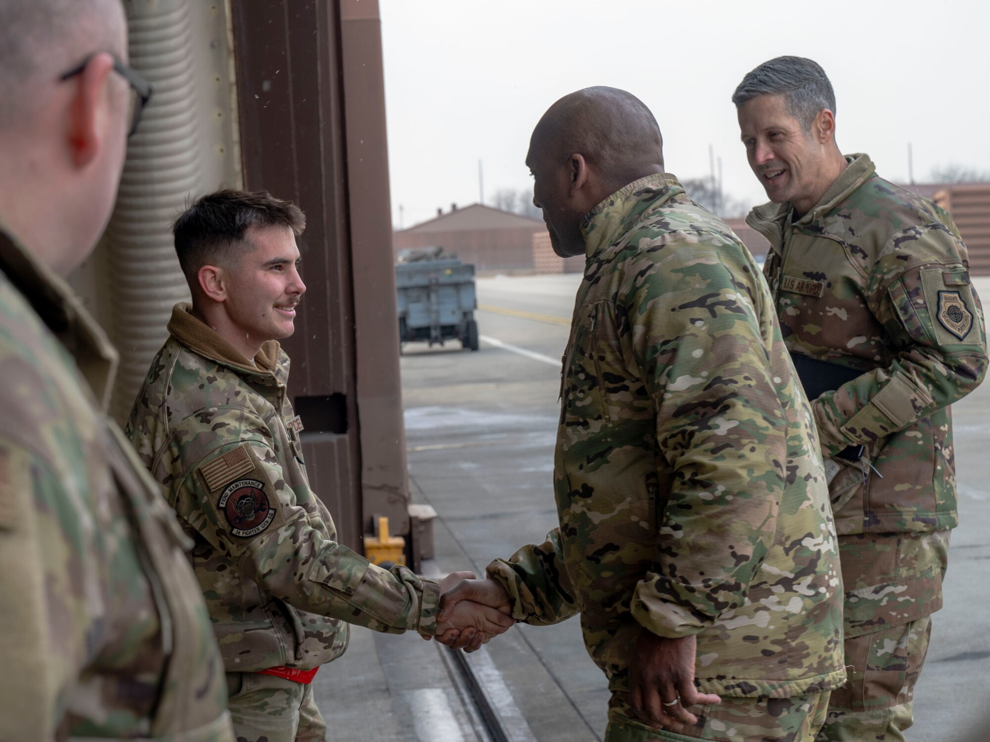 U.S. Army Gen. Xavier T. Brunson, right, United Nations Command, Combined Forces Command and United States Forces Korea commander, meets with U.S. Air Force Airman 1st Class Parker Kelly, 36th Fighter Generation Squadron assistant dedication crew chief, during a visit at Osan Air Base, Republic of Korea, Jan. 8, 2025. The USFK leaders met with Osan AB Airmen and visited the 36th Fighter Squadron, 607th Air Operations Center, and Space Force facilities. (U.S. Air Force photo by Senior Airman Sabrina Fuller-Judd)