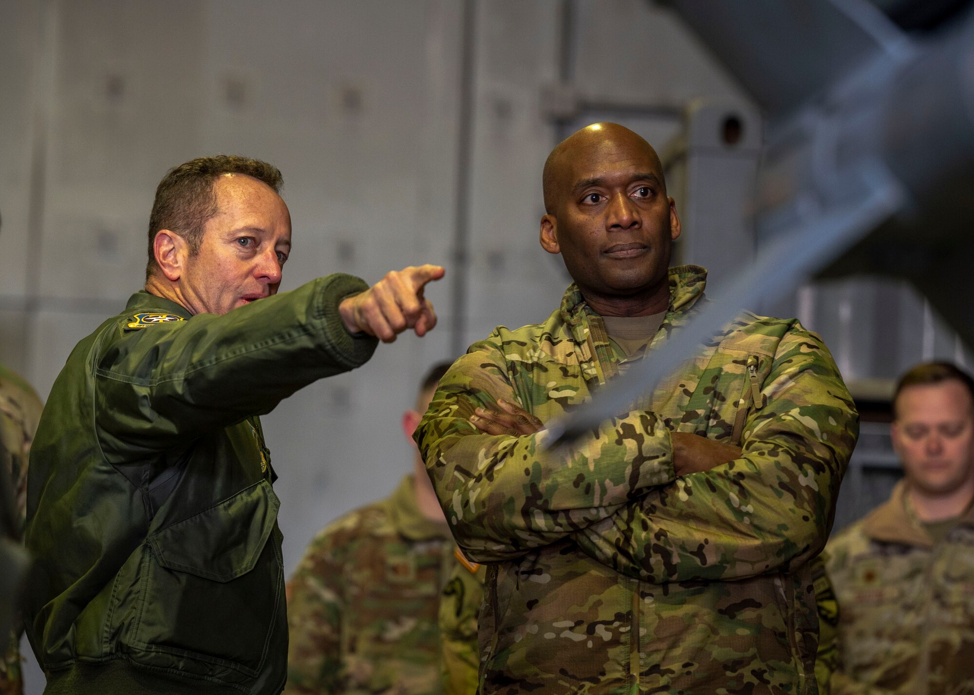 U.S. Army Gen. Xavier T. Brunson, right, United Nations Command, Combined Forces Command and United States Forces Korea commander, discusses the capabilities of an F-16 Fighting Falcon with U.S. Air Force Lt. Gen. David R. Iverson, Seventh Air Force commander, during a visit at Osan Air Base, Republic of Korea, Jan. 8, 2025. The USFK commander learned about the 51st FW Fight Tonight mission, further bolstering his understanding of combat capabilities across the Korean peninsula. (U.S. Air Force photo by Senior Airman Sabrina Fuller-Judd)