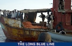 In 2009, members of LEDET 409 detained suspected pirates in the Gulf of Aden as part of Combined Task Force 151. (U.S. Coast Guard)