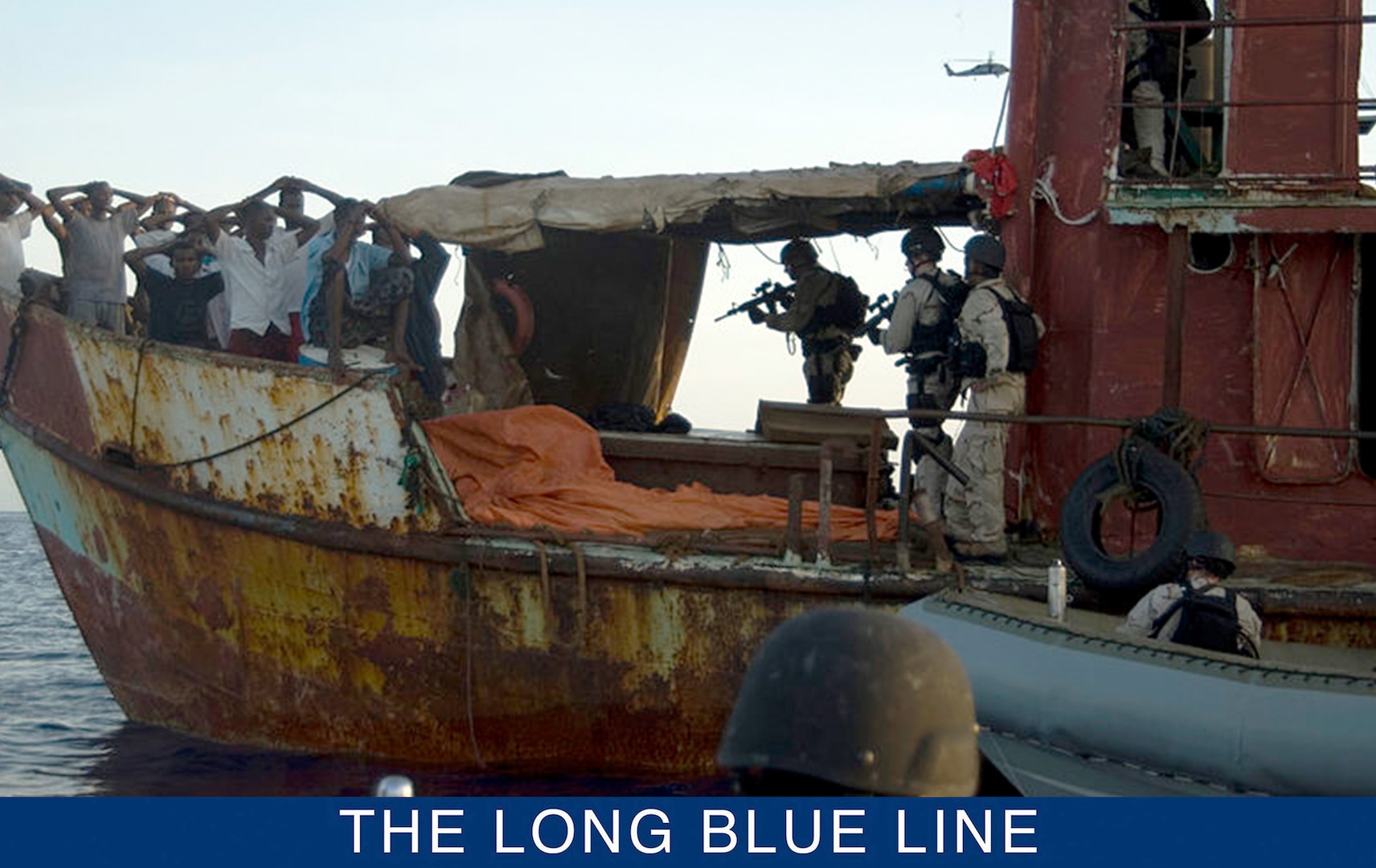 In 2009, members of LEDET 409 detained suspected pirates in the Gulf of Aden as part of Combined Task Force 151. (U.S. Coast Guard)