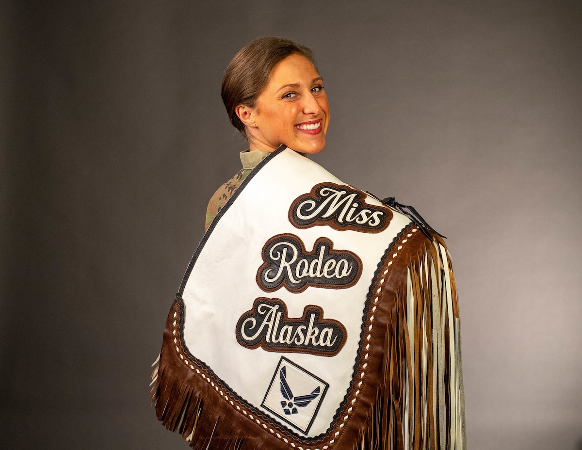 U.S. Air Force 2nd Lt. Codi Clemmons poses with her custom Miss Rodeo Alaska chaps.