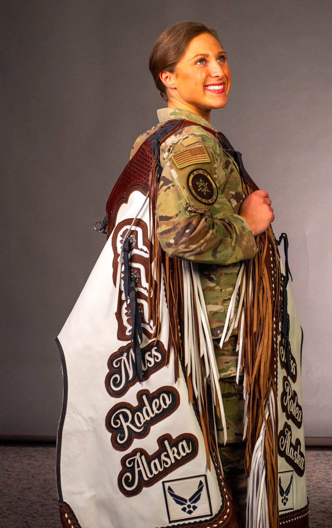 U.S. Air Force 2nd Lt. Codi Clemmons poses with her custom Miss Rodeo Alaska.