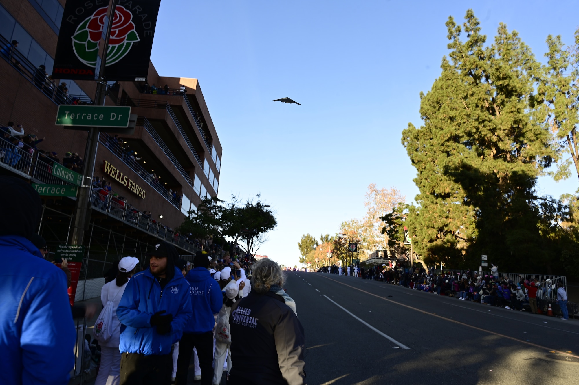 A B-2 Spirit flies over the 2025 Rose Parade, Pasadena, California, Jan. 1, 2025.  Airmen from the 509th Bomb Wing participated in the Tournament of Roses Parade and the Rose Bowl to engage with the community and showcase the professionalism, readiness, and dedication of the U.S. Air Force. (U.S. Air Forces photo by Tech. Sgt. Heather Salazar)