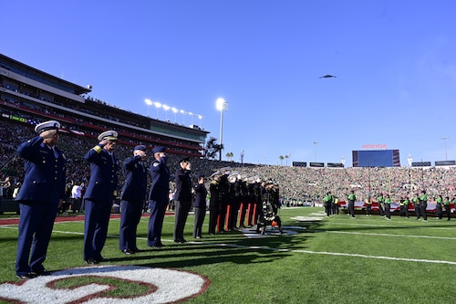 Members of the DoD participate in the opening ceremony of the  2025 Rose Bowl, Pasadena, California, Jan. 1, 2025.  Members also  participated in the Tournament of Roses Parade and the Rose Bowl to engage with the community and showcase the professionalism, readiness, and dedication of the U.S. military (U.S. Air Forces photo by Tech. Sgt. Heather Salazar)