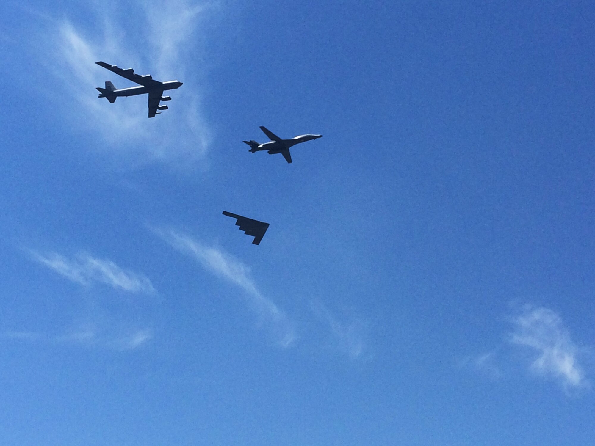 A Dyess B-1B Lancer flies in a formation with a B-52H Stratoforstress and a B-2 Spirit during the Dyess Big Country Airfest May 3, 2015, at Dyess Air Force Base, Texas