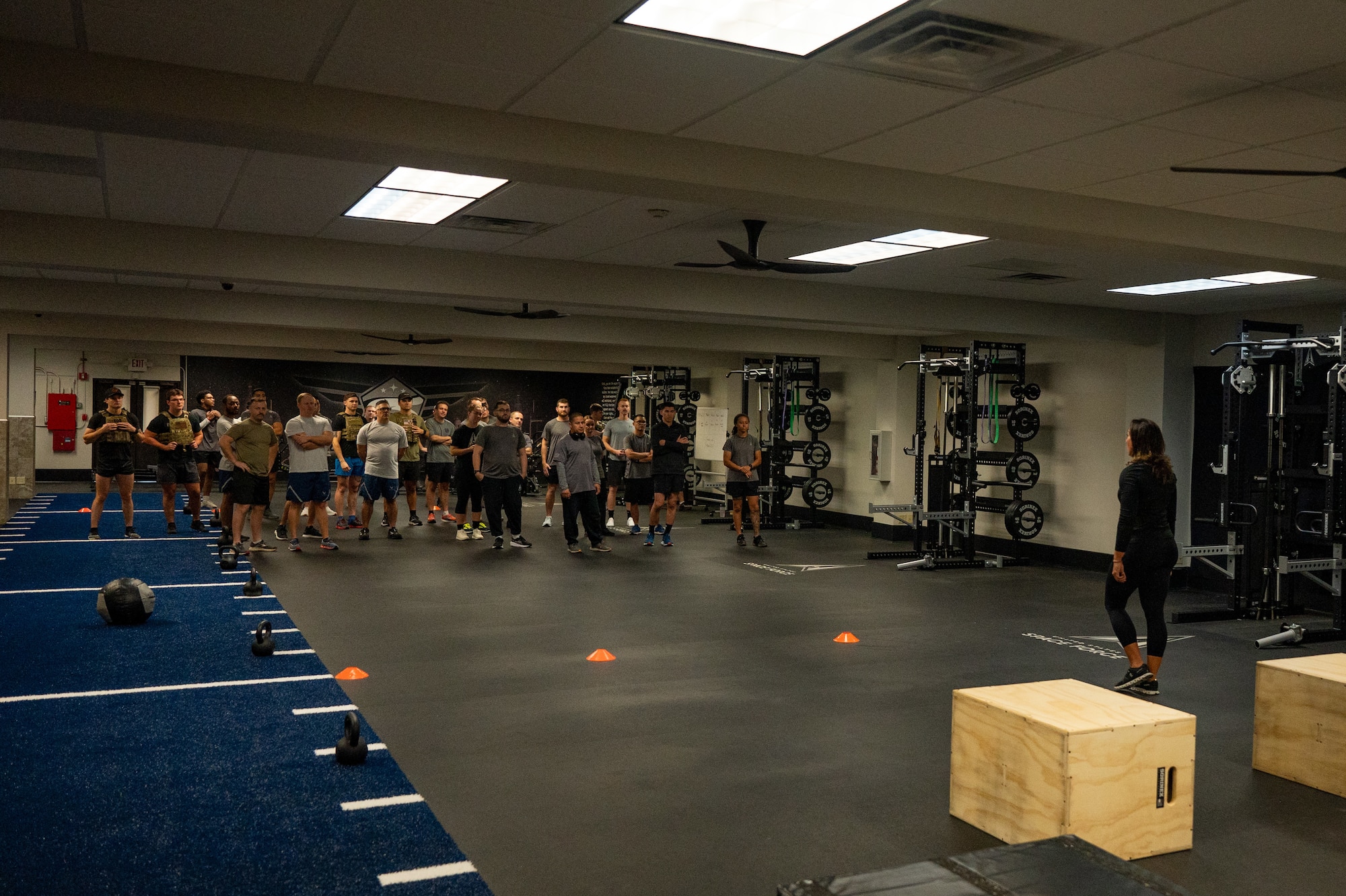 Catherine Wallace, Space Launch Delta 45 Guardian Resiliency Team strength and conditioning specialist, discusses workout specifics inside the Fitness Center at Patrick Space Force Base, Florida, Jan. 10, 2025. The SLD 45 GRT supports Guardian‘s overall well-being and readiness by providing resources and strategies to enhance their physical, mental and emotional resilience.