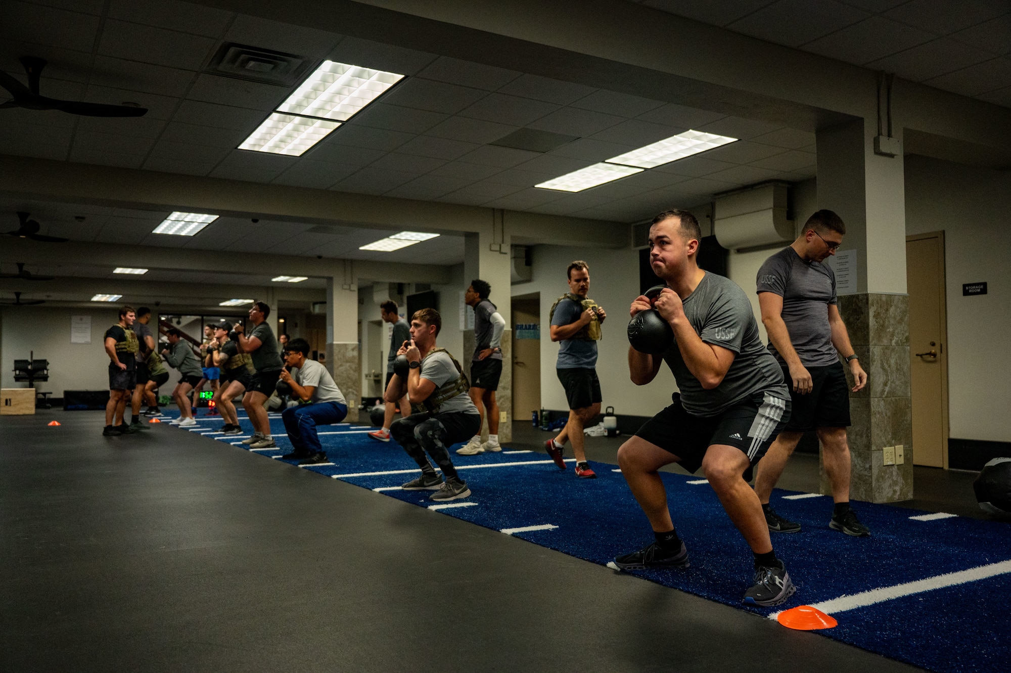 Space Launch Delta 45 Guardians perform squats during a Guardian Resiliency Team workout at Patrick Space Force Base, Florida, Jan. 10, 2025. The SLD 45 GRT supports Guardian‘s overall well-being and readiness by providing resources and strategies to enhance their physical, mental and emotional resilience.