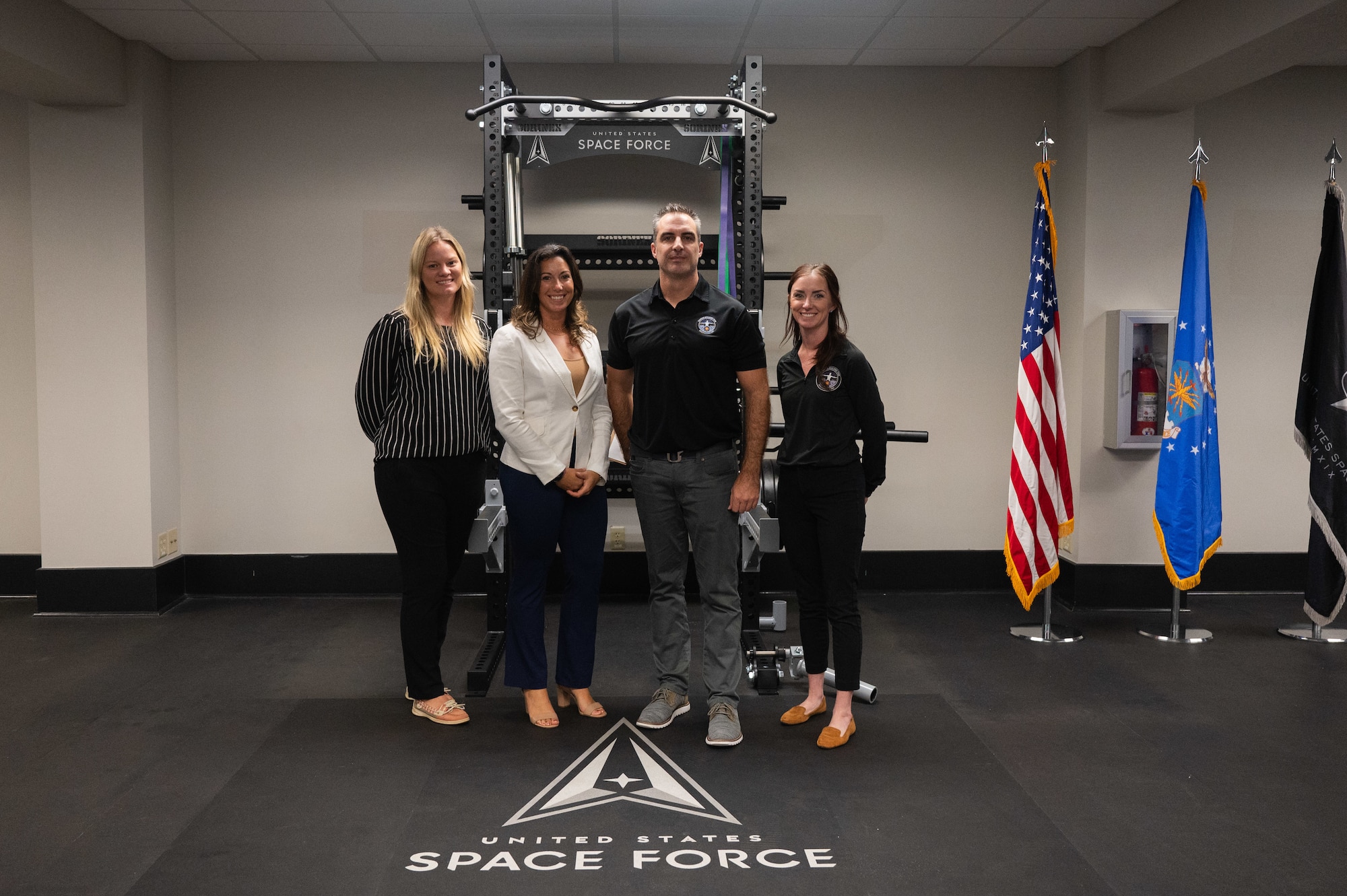 Guardian Resilience Team poses for a photo inside the Fitness Center’s recently renovated training room at Patrick Space Force Base, Florida, Jan . 10, 2025.  The SLD 45 GRT team funded renovations for this training room to enhance physical fitness resources, promoting well-being and operational mission readiness of Guradians.