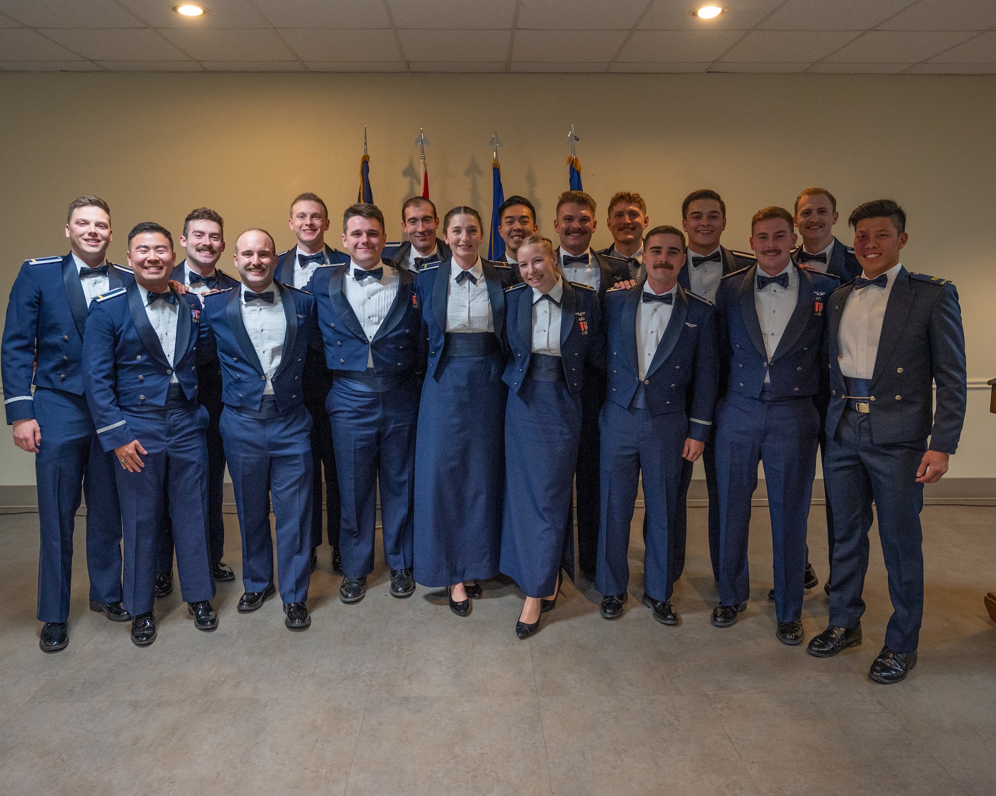 The graduating class of 24-05 pose together for a group photo at Laughlin Air Force Base, Texas, Jan. 9, 2025. Seventeen U.S. Air Force officers were awarded silver wings during the ceremony, symbolizing their completion of the Undergraduate Pilot Training program. (U.S. Air Force photo by Staff Sgt. Nicholas Larsen)