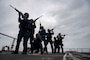 The Visit Board Search and Seizure (VBSS) team participates in a VBSS drill on the flight deck aboard the Arleigh Burke-class guided-missile destroyer USS Sterett (DDG 104), Jan. 9, 2025.