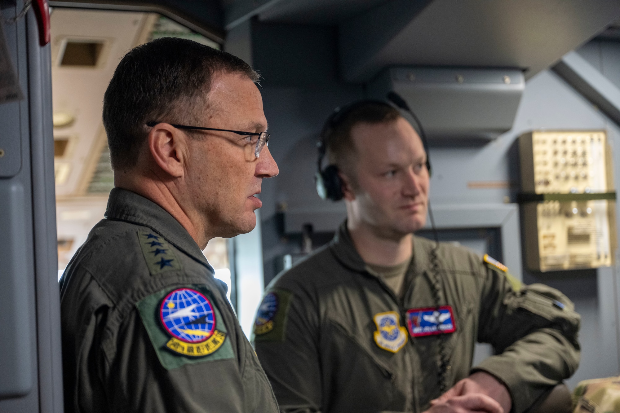 Gen. John Lamontagne, Air Mobility Command commander, (left) speaks with Master Sgt. John Lauterbach, 22nd Operations Group superintendent, (right) on a KC-46A Pegasus assigned to McConnell Air Force Base, Kansas, Jan. 8, 2025. During his two-day visit, Lamontagne received a mission brief from Team McConnell leadership, hosted an all-call, gained hands-on experience in the KC-46A Pegasus Weapons System and Boom Operator Trainers, flew in a KC-46, visited the Innovation Lab and more. (U.S. Air Force photo by Senior Airman Felicia Przydzial)