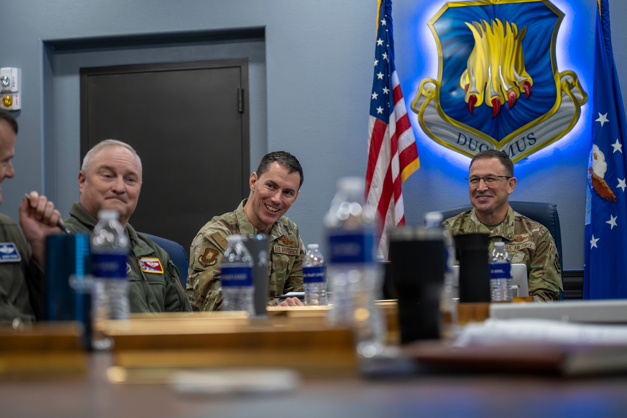 Col. Matthew Basler, 931st Operations Group commander, Col. Cory Damon, 22nd Air Refueling Wing commander, and Gen. John Lamontagne, Air Mobility Command commander, speak during a mission brief at McConnell Air Force Base, Kansas, Jan. 7, 2025. Lamontagne visited some of McConnell’s facilities including the Innovation Lab and the KC-46A Pegasus flight simulator. (U.S. Air Force photo by Airman 1st Class Paula Arce)