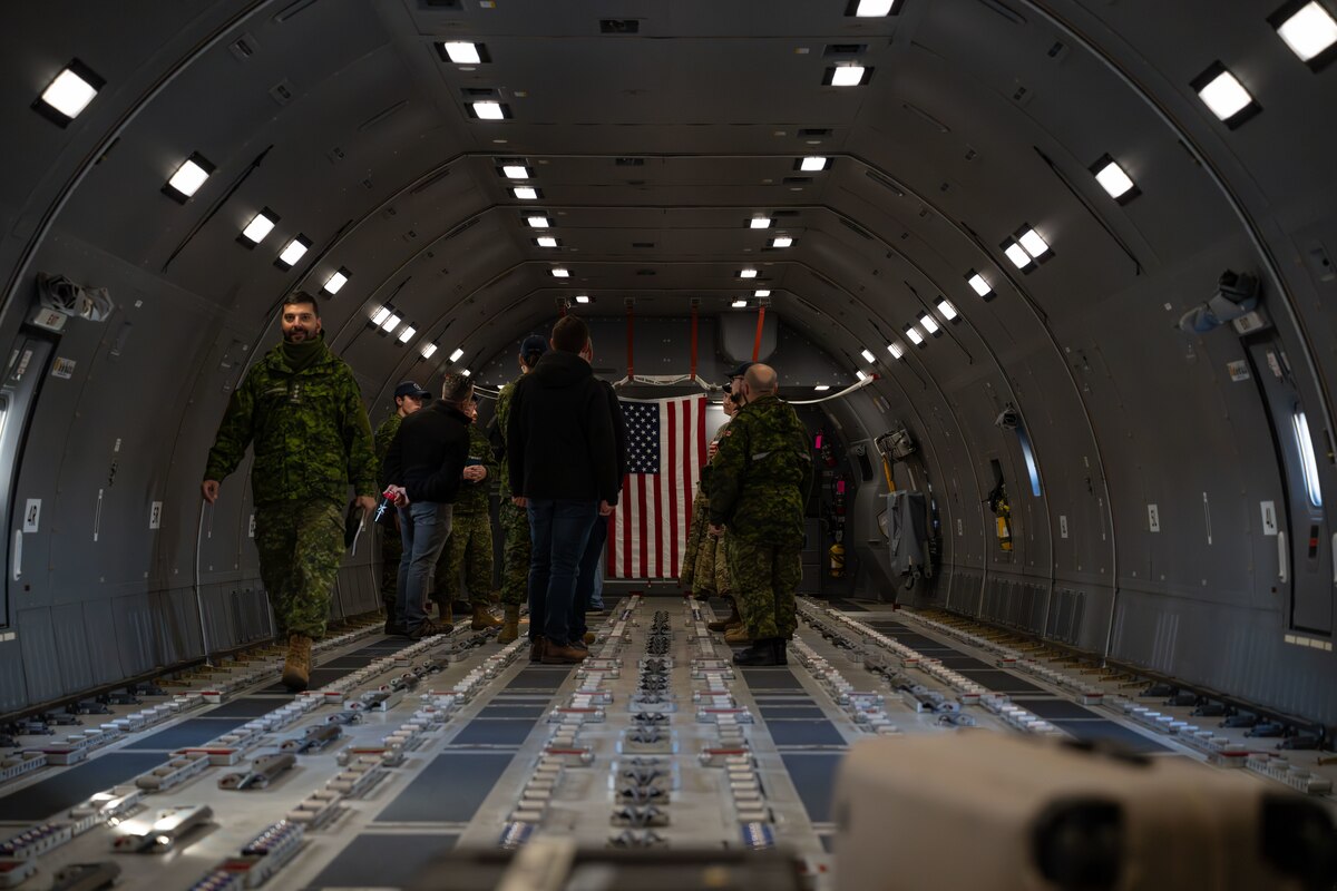 Canadian Armed Forces members tour a KC-46A Pegasus aircraft assigned to the 305th Air Mobility Wing during a joint training exercise at Canadian Forces base Trenton, Ontario, Nov. 15, 2024. The training focused on the capabilities of the KC-46 Pegasus aircraft, with a significant emphasis on aerial refueling—a critical specialty the RCAF is poised to adopt and begin operations in 2027. (U.S. Air Force photo by Tech. Sgt. Monica Roybal)