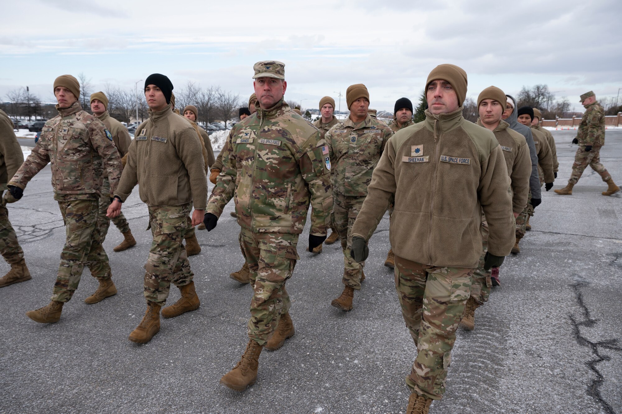Photo of U.S. Space Force Guardians marching outside in pavement.