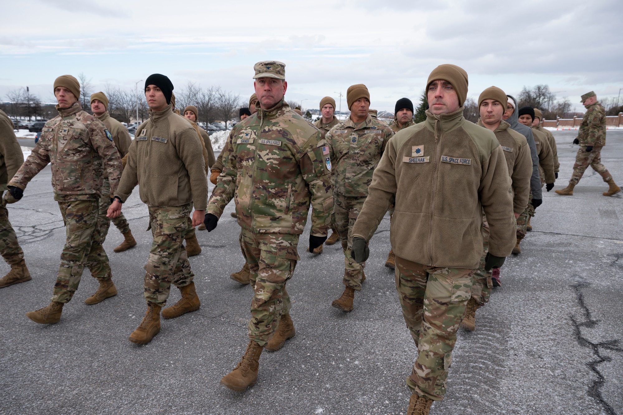 Photo of U.S. Space Force Guardians marching outside in pavement.