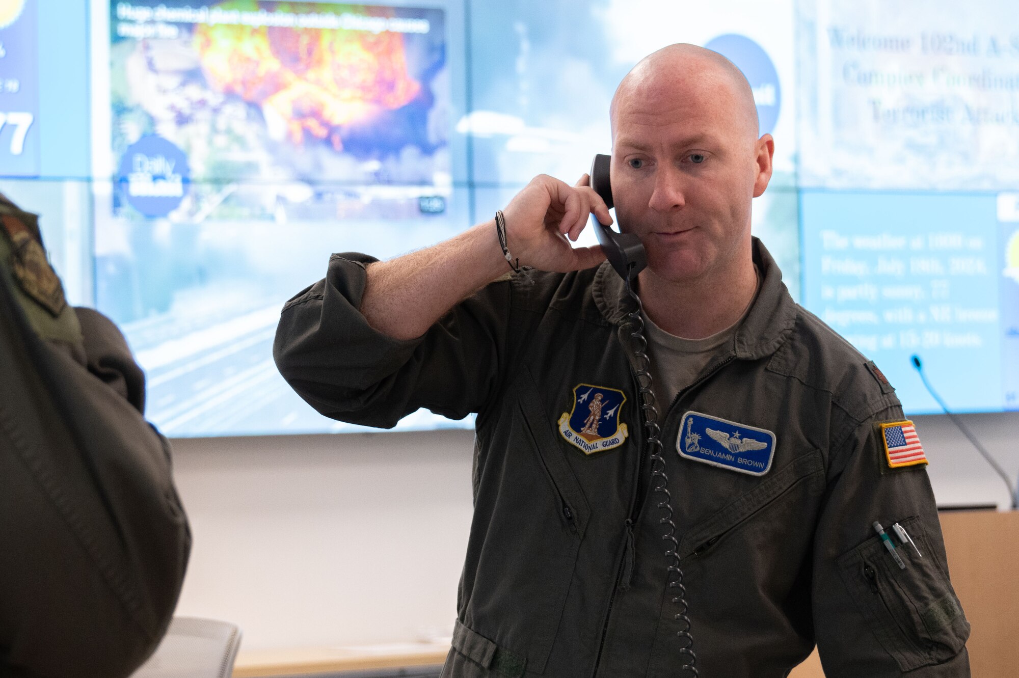Airmen speaks ona phone.