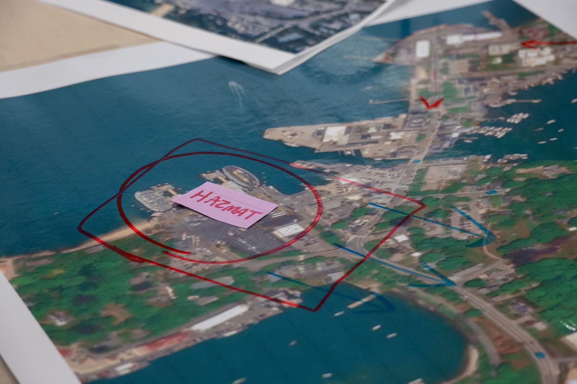 The word "HAZMAT" is written on a map.