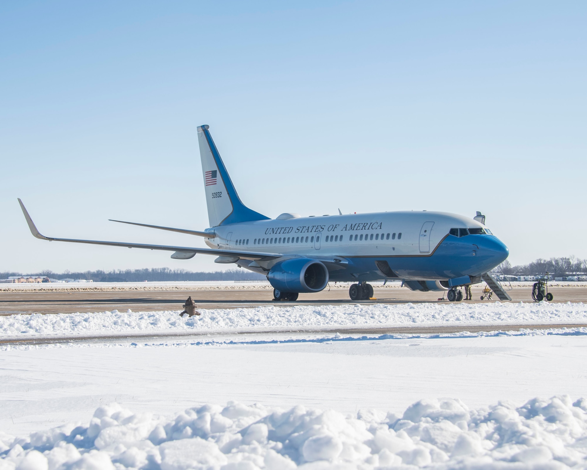 A C-40 from the 932nd Airlift Wing recently provided distinguished airlift support, during mission essential manning, for Gen. Randall Reed, U.S. Transportation Command commander and his team on January 7th, 2025. Despite the 10.9 inches of snow and ice that had fallen, the dedicated team from the 73rd Airlift squadron and 54th Airlift Squadron persevered and successfully accomplished the flight mission. (U.S. Air Force photo by Staff Sgt. Brooke Spenner)