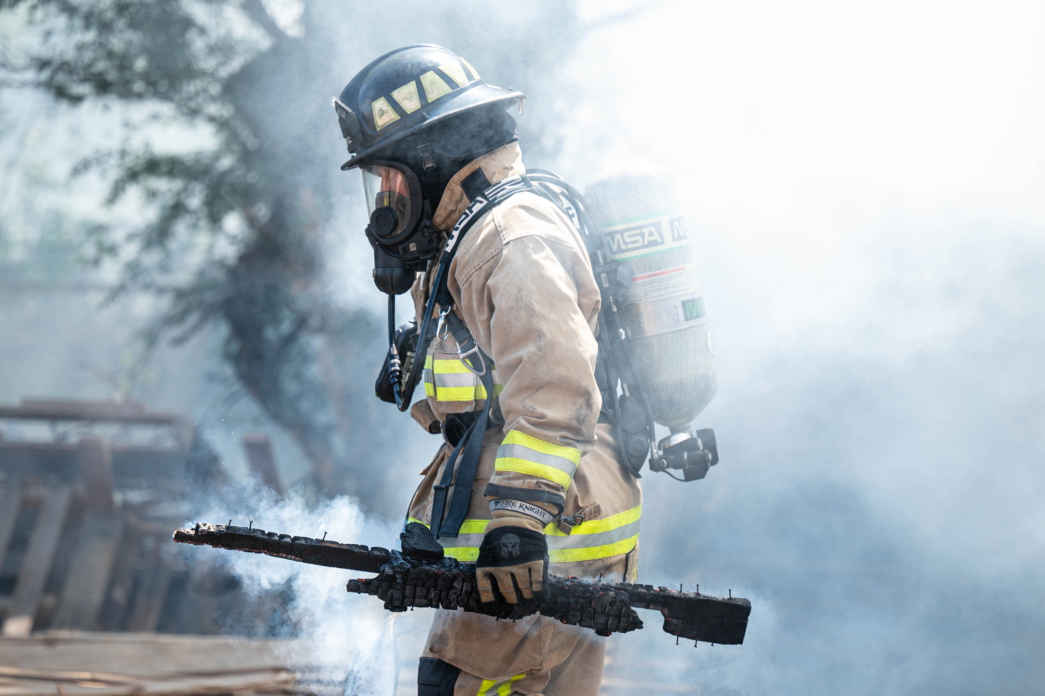 A Reserve Citizen Airman from the 624th Civil Engineering Squadron gives critical instructions while directing teammates during a live firefighting exercise in Kahului, Maui, Sept. 8, 2024.