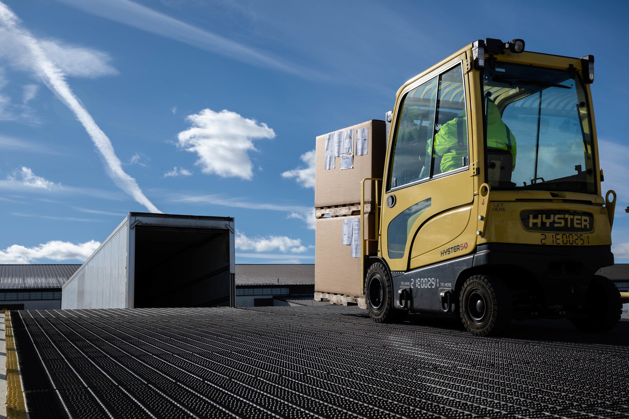 James Jennings, 305th Aerial Port Squadron material handler, unloads food rations at Joint Base McGuire-Dix-Lakehurst, N.J., Jan. 8, 2025. The 305th Air Mobility Wing operates two of America's largest strategic aerial ports supporting the delivery of cargo and personnel to combatant commanders abroad. (U.S. Air Force photo by Senior Airman Aidan Thompson)