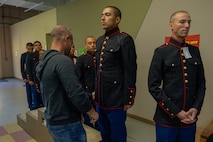 U.S. Marine Corps recruits with India Company, 3rd Recruit Training Battalion, are fitted for Dress Blues coats during their first uniform fitting at Marine Corps Recruit Depot San Diego, California, Jan. 7, 2025. Recruits are fitted several times throughout recruit training to ensure their uniforms are as ready as possible for wear as United States Marines. (U.S. Marine Corps photo by Lance Cpl. Jacob B. Hutchinson)