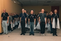 U.S. Marine Corps recruits with Delta Company, 1st Recruit Training Battalion, are issued gear during a receiving event at Marine Corps Recruit Depot San Diego, California, Jan. 6, 2025. During the receiving process, recruits are taken to the United Service Organizations for accountability, checked for contraband, given haircuts, make scripted phone calls home, and issued gear required for training. Our Marines continue to serve their nation and their Corps through their lived examples of our values and by helping to identify and select potential recruits who may have what it takes to earn the title. (U.S. Marine Corps photo by Lance Cpl. Janell B. Alvarez)