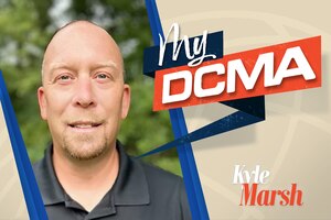 An image of Kyle Marsh looking with the "My DCMA" logo over the image.