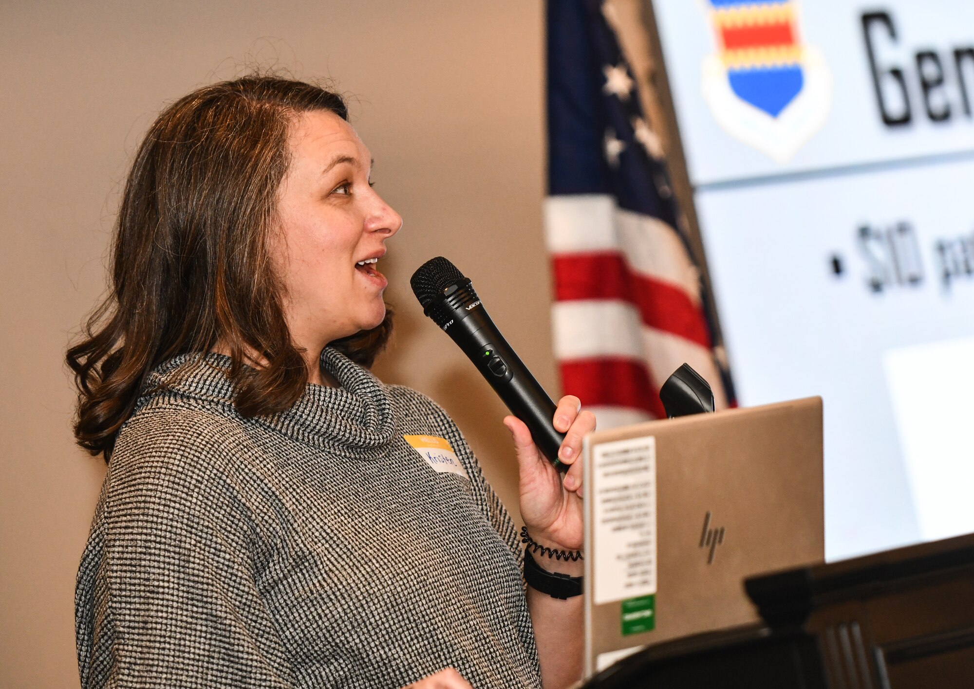 Lt. Col. Kristen Rosenberg, 55th Operations Support Squadron commander, speaks at the Warhawk Athena Conference at Offutt Air Force Base on Jan. 7, 2024. Warhawk Athena follows the model of Air Combat Command’s Sword Athena, which is a working group of volunteers from across ACC that come together to identify, tackle and propose solutions to women and family centric barriers to readiness. (U.S. Air Force photo by Chad Watkins)