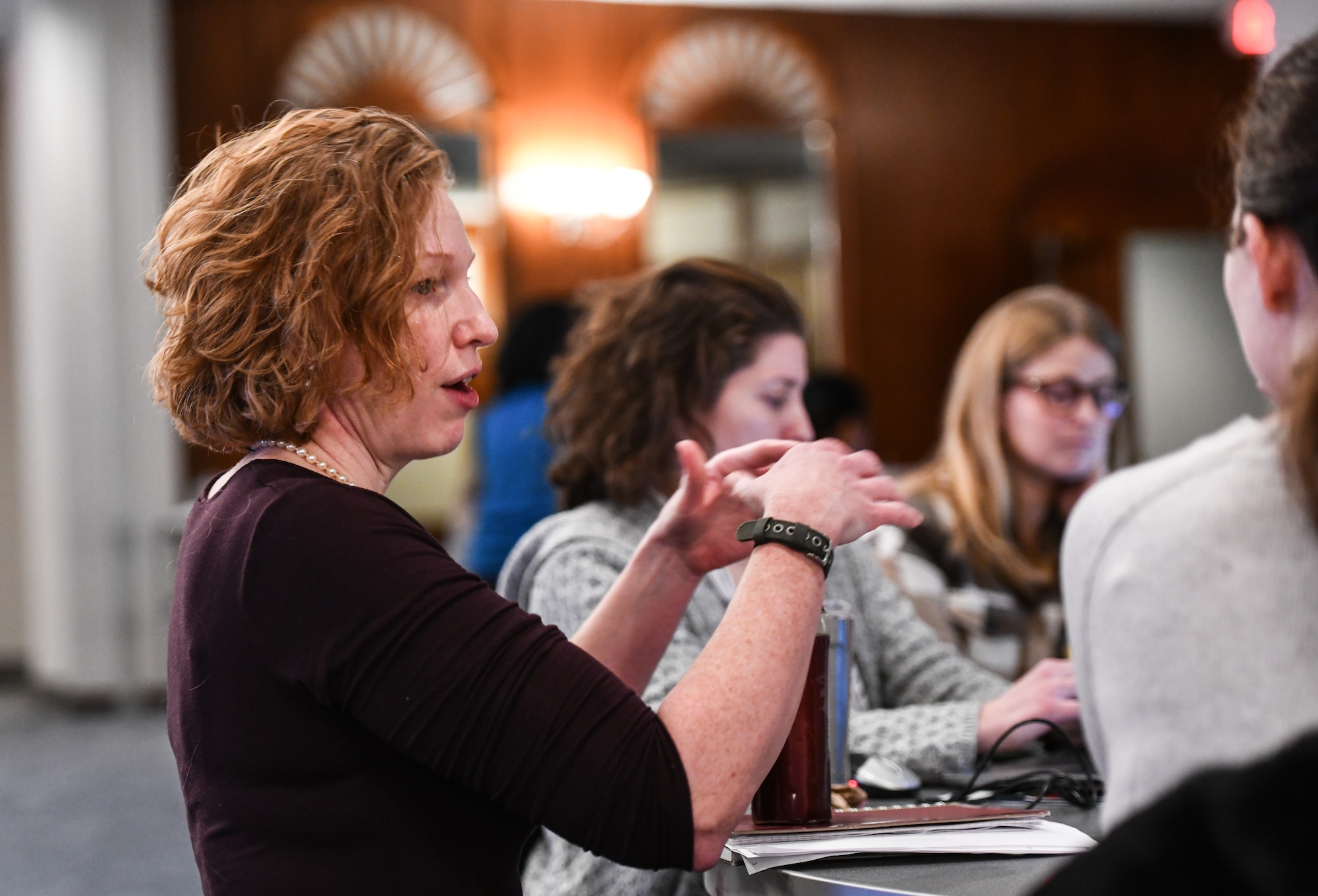 Senior Master Sgt. Aubree Woodworth, 338th Combat Training Squadron superintendent, speaks to a working group at the Warhawk Athena Conference on Offutt Air Force Base, Jan. 7, 2024.  Warhawk Athena is Offutt’s Barrier Analysis Working Group focused on identifying and breaking down barriers to readiness with an emphasis on women- and family-centric barriers, and aims to increase the quality of life for all Airmen on the installation. (U.S. Air Force photo by Chad Watkins)