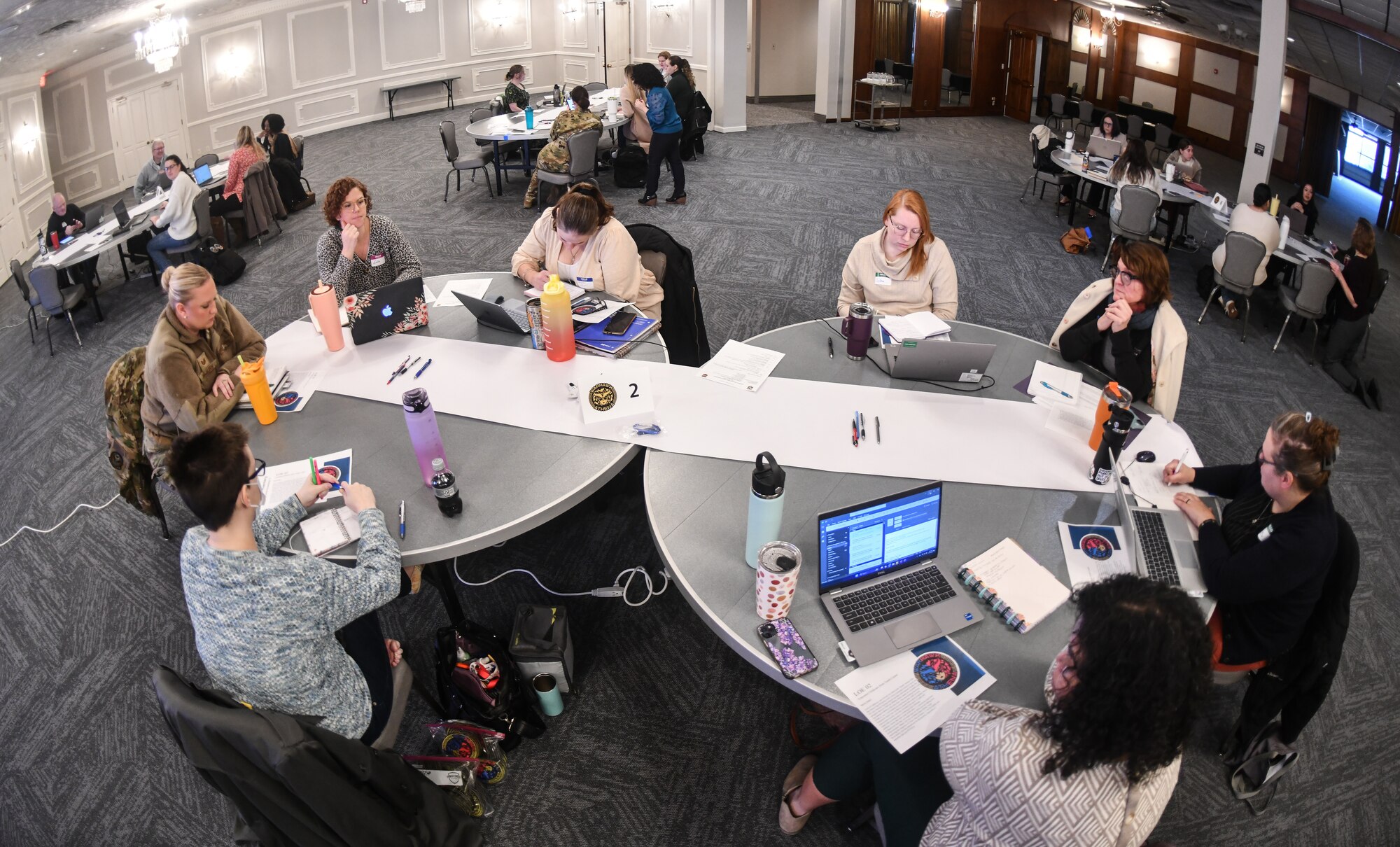 Airmen participate in a working group at the Warhawk Athena Conference at Offutt Air Force Base on Jan. 7, 2025. Over 40 participants from the 55th Wing, 557th Weather Wing, 95th Wing, and U.S. Strategic Command gathered in working groups to focus on this conference’s lines of effort: better designated parking spaces for pregnancy and physical accommodations; extended childcare from the youth center; lactation accommodation for training events; feminine hygiene products in federal facilities; RC-135 lavatory issues; and CCCA/D program improvements. (U.S. Air Force photo by Chad Watkins)