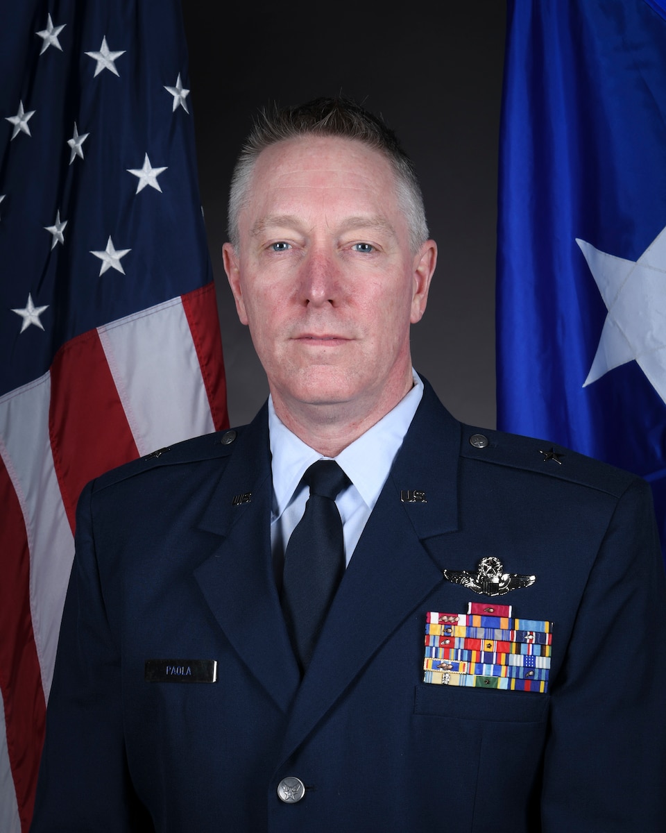 An Air Force members stands for a portrait.