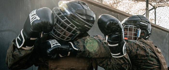 U.S. Marines from Marine Corps Recruit Depot San Diego and Marine Corps Base Camp Pendleton participate in a culminating event during a Marine Corps Martial Arts Instructor Course at MCRD San Diego, California, Dec. 18, 2024. After three weeks of training, MAI Course Class 19-24 conducted a five-hour culminating event that challenged students to show expertise in ground fighting, weapons-free sparring, and bayonet and knife techniques. (U.S. Marine Corps photo by Cpl. Sarah M. Grawcock)