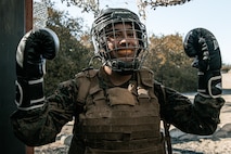 U.S. Marine Corps Criminal Investigator, Sgt. Xitlali Gonzalez with Criminal Investigation Division, Marine Corps Recruit Depot San Diego, poses for a photo during the culminating event of a Marine Corps Martial Arts Instructor Course at MCRD San Diego, California, Dec. 18, 2024. After three weeks of training, MAI Course Class 19-24 conducted a five-hour culminating event that challenged students to show expertise in ground fighting, weapons-free sparring, and bayonet and knife techniques. (U.S. Marine Corps photo by Cpl. Sarah M. Grawcock)