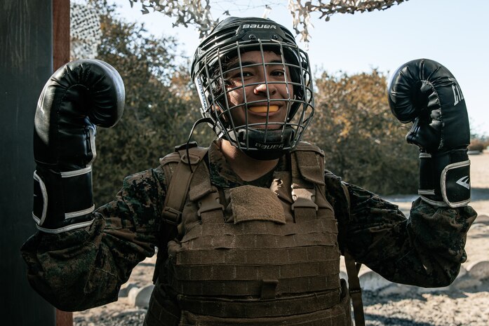 U.S. Marine Corps Criminal Investigator, Sgt. Xitlali Gonzalez with Criminal Investigation Division, Marine Corps Recruit Depot San Diego, poses for a photo during the culminating event of a Marine Corps Martial Arts Instructor Course at MCRD San Diego, California, Dec. 18, 2024. After three weeks of training, MAI Course Class 19-24 conducted a five-hour culminating event that challenged students to show expertise in ground fighting, weapons-free sparring, and bayonet and knife techniques. (U.S. Marine Corps photo by Cpl. Sarah M. Grawcock)