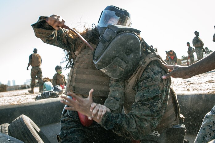 U.S. Marines from Marine Corps Recruit Depot San Diego and Marine Corps Base Camp Pendleton participate in a culminating event during a Marine Corps Martial Arts Instructor Course at MCRD San Diego, California, Dec. 18, 2024. After three weeks of training, MAI Course Class 19-24 conducted a five-hour culminating event that challenged students to show expertise in ground fighting, weapons-free sparring, and bayonet and knife techniques. (U.S. Marine Corps photo by Cpl. Sarah M. Grawcock)