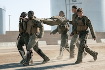 U.S. Marines from Marine Corps Recruit Depot San Diego and Marine Corps Base Camp Pendleton participate in a culminating event during a Marine Corps Martial Arts Instructor Course at MCRD San Diego, California, Dec. 18, 2024. After three weeks of training, MAI Course Class 19-24 conducted a five-hour culminating event that challenged students to show expertise in ground fighting, weapons-free sparring, and bayonet and knife techniques. (U.S. Marine Corps photo by Cpl. Sarah M. Grawcock)