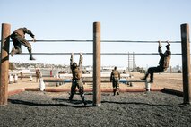 U.S. Marines from Marine Corps Recruit Depot San Diego and Marine Corps Base Camp Pendleton participate in a culminating event during a Marine Corps Martial Arts Instructor Course at MCRD San Diego, California, Dec. 18, 2024. After three weeks of training, MAI Course Class 19-24 conducted a five-hour culminating event that challenged students to show expertise in ground fighting, weapons-free sparring, and bayonet and knife techniques. (U.S. Marine Corps photo by Cpl. Sarah M. Grawcock)