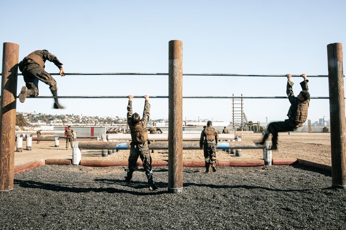 U.S. Marines from Marine Corps Recruit Depot San Diego and Marine Corps Base Camp Pendleton participate in a culminating event during a Marine Corps Martial Arts Instructor Course at MCRD San Diego, California, Dec. 18, 2024. After three weeks of training, MAI Course Class 19-24 conducted a five-hour culminating event that challenged students to show expertise in ground fighting, weapons-free sparring, and bayonet and knife techniques. (U.S. Marine Corps photo by Cpl. Sarah M. Grawcock)
