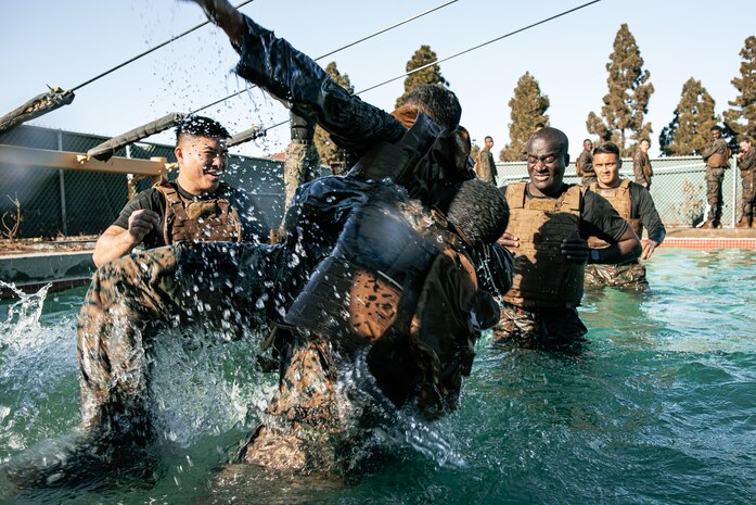 U.S. Marines from Marine Corps Recruit Depot San Diego and Marine Corps Base Camp Pendleton participate in a culminating event during a Marine Corps Martial Arts Instructor Course at MCRD San Diego, California, Dec. 18, 2024. After three weeks of training, MAI Course Class 19-24 conducted a five-hour culminating event that challenged students to show expertise in ground fighting, weapons-free sparring, and bayonet and knife techniques. (U.S. Marine Corps photo by Cpl. Sarah M. Grawcock)