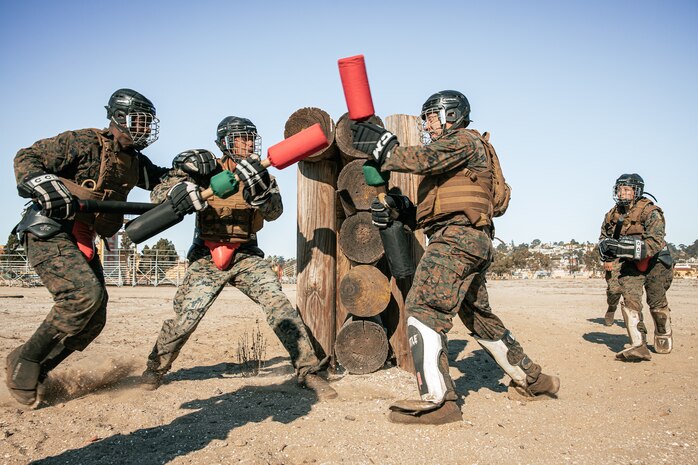U.S. Marines from Marine Corps Recruit Depot San Diego and Marine Corps Base Camp Pendleton participates in a culminating event during a Marine Corps Martial Arts Instructor Course at MCRD San Diego, California, Dec. 18, 2024. After three weeks of training, MAI Course Class 19-24 conducted a five-hour culminating event that challenged students to show expertise in ground fighting, weapons-free sparring, and bayonet and knife techniques. (U.S. Marine Corps photo by Cpl. Sarah M. Grawcock)