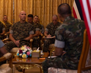 U.S. Marines with U.S. Marine Corps Forces, Pacific, listen Royal Thai Marine Corps Rear Adm. Nirat Tagoodruar, deputy commanding officer, deliver opening remarks during the USMC-RTMC Future Engagement Planning Conference in Sattahip, Thailand, Dec. 11, 2024. These discussions strengthen the enduring partnership between the two forces by fostering military-to-military collaboration, enhancing combined readiness, and supporting a shared commitment to maintaining a free and open Indo-Pacific. (U.S. Marine Corps photo by Cpl. Conor Ragland)