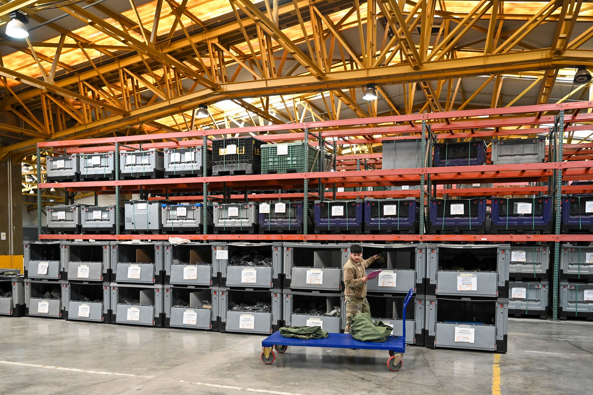 Senior Airman Thawatchai Duangkla, 39th Logistics Readiness Squadron Individual Protection Equipment journeyman, prepares initial issue bags to new members assigned to Incirlik Air Base, Türkiye, Dec. 19, 2024. The IPE team plays a crucial role in maintaining and distributing essential gear, ensuring Airmen are equipped for both training exercises and real-world threats that support NATO’s mission. (U.S. Air Force photo by Staff Sgt. Joshua Hoskins)