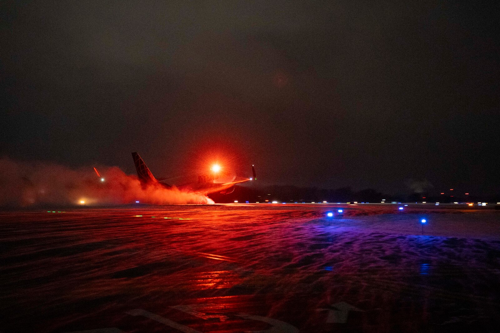 Photo of Airmen assigned to the 158th Fighter Wing taking off in an aircraft that will bring them to their deployed location, from the Burlington International Airport in South Burlington, Vermont, on Jan. 8, 2025.