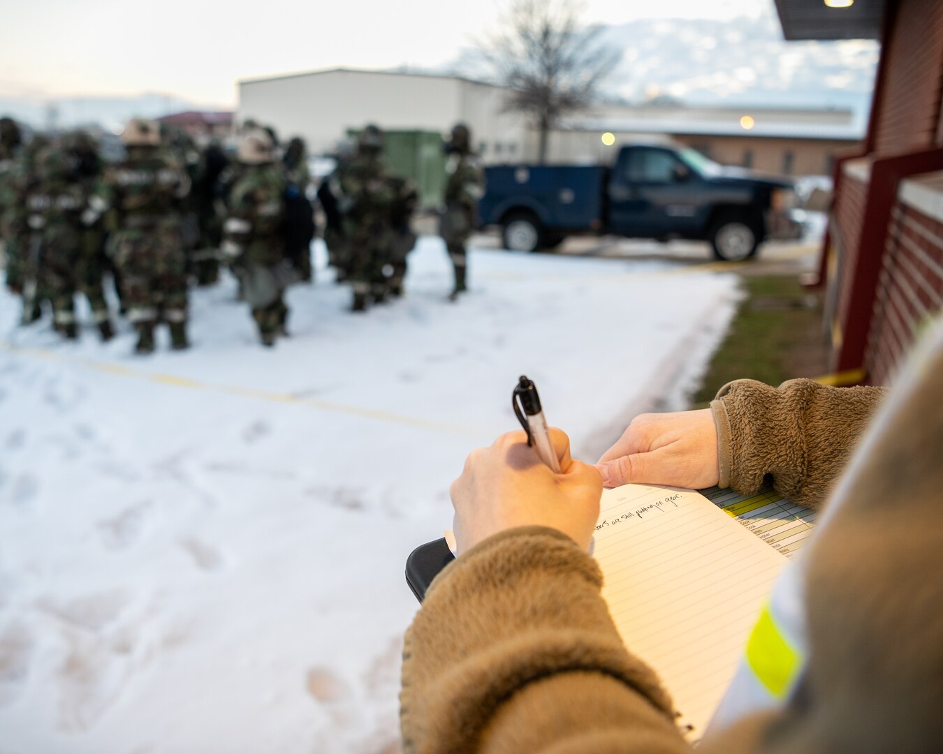 Master Sgt. Lareina Mathers, 138th Communications Squadron, evaluates the 138th Communications Squadron during a base wide exercise Tulsa Air National Guard Base, Okla., Jan. 12, 2025. Mathers is also a Wing Inspection Team member, and was responsible with ensuring Airmen followed protocol and demonstrated their ability to operate in a contested environment during the exercise. (Oklahoma Air National Guard photo by Senior Airman Addison Barnes)